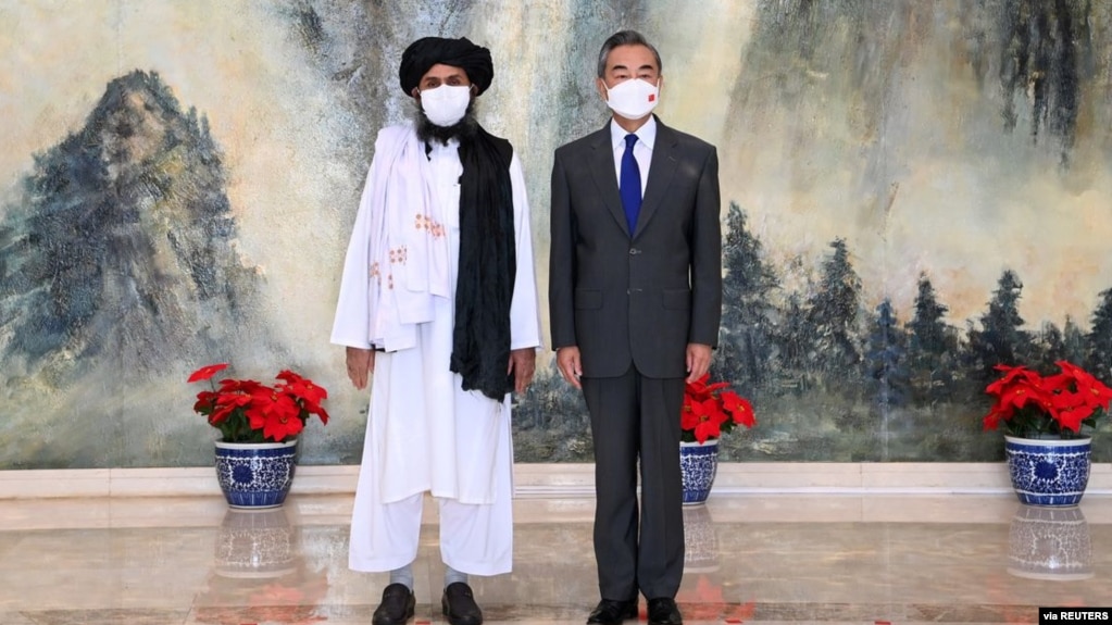 中国外长王毅今年7月在天津会晤塔利班代表(photo:VOA)
