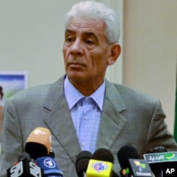 Libya's FM Moussa Koussa holds a news conference in Tripoli Mar 18 2011