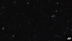  This image from NASA shows a portion of the southern field of the Great Observatories Origins Deep Survey to recalculate the total number of galaxies in the observable universe. In a report published Oct. 13, 2016, an international team of astronomers have found that the universe contains at least 2 trillion galaxies.