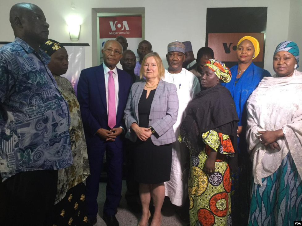 Africa Division Director Negussie Mengesha, VOA Director Amanda Bennett and Hausa Managing Editor Aliyu Mustapha meet with parents of Chibok girls, a group of young women kidnapped by Boko Haram terrorists in 2014. The VOA documentary &ldquo;Journey from Evil&rdquo; about the journey of many of the Chibok girls was screened at the meeting.