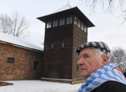 FILE - Stanislaw Zalewski, pictured at Auschwitz-Birkenau a year ago, is president of the Polish Union of Former Political Prisoners of Nazi Prisons and Concentration Camps. Seventy-five years on, he still struggles to reconcile what happened.