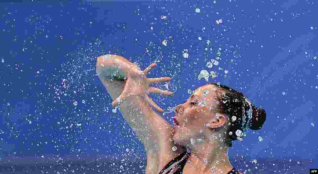 Israel&#39;s Polina Prikazchikova competes in the final of the Solo Free Artistic Swimming event during the LEN European Aquatics Championships at the Duna Arena in Budapest, Hungary.