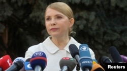Yulia Tymoshenko is seen speaking at a news conference in Kyiv, March 27, 2014.
