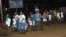 Residents of Tandag city, Surigao Del Sur province in southern Philippines, flee to higher grounds, following a 7.6-magnitude earthquake that struck eastern and southern parts of the country, August 31, 2012.