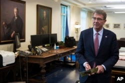 FILE - Former US Defense Secretary Ash Carter.