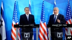 Speaker of the United States House of Representatives John Boehner, left, and Israel's Prime Minister Benjamin Netanyahu, right, make statements during a press conference at the prime minister's office in Jerusalem, April 1, 2015. 