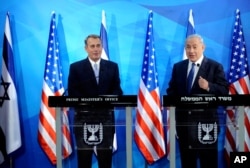 Speaker of the United States House of Representatives John Boehner, left, and Israel's Prime Minister Benjamin Netanyahu, right, make statements during a press conference at the prime minister's office in Jerusalem, April 1, 2015.