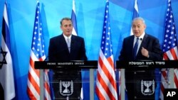 Speaker of the United States House of Representatives John Boehner, left, and Israel's Prime Minister Benjamin Netanyahu, right, make statements during a press conference at the prime minister's office in Jerusalem, April 1, 2015. 