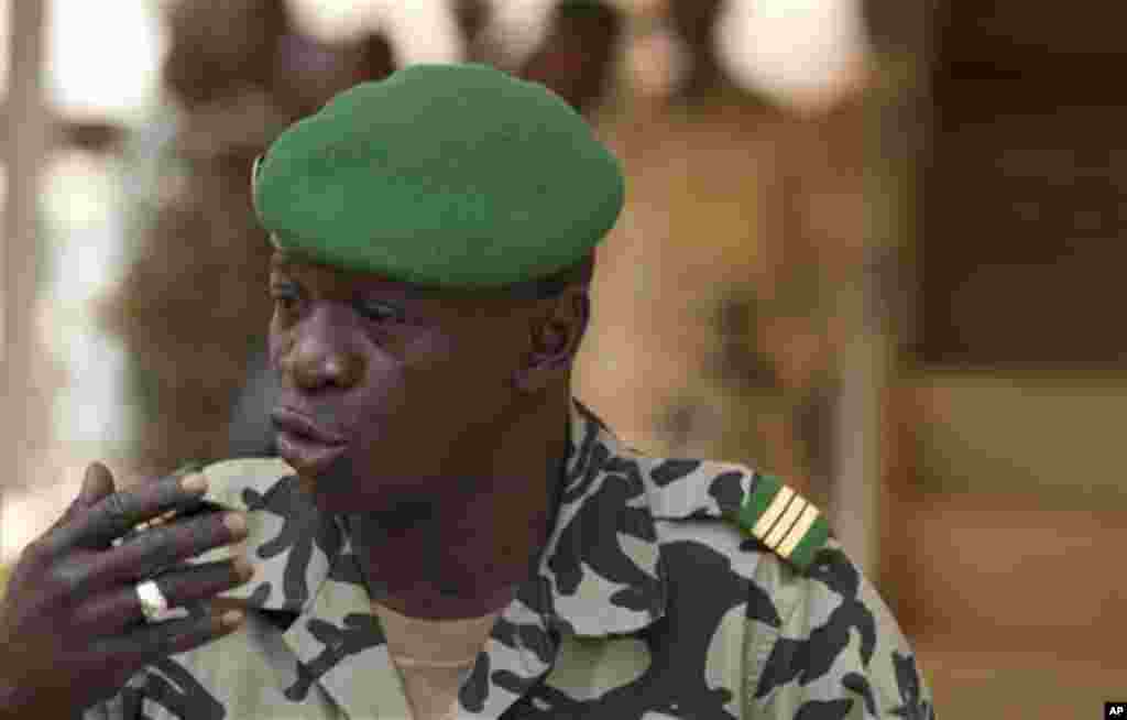 Coup leader Capt. Amadou Haya Sanogo addresses the press at junta headquarters in Kati, outside Bamako, Mali Friday, March 30, 2012.