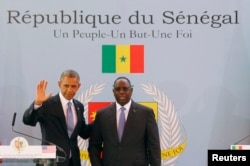 U.S. President Barack Obama participates in a joint news conference with Senegal's President Macky Sall in Dakar, June 27, 2013.