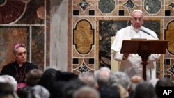 Pope Francis speaks during an audience with diplomats accredited to the Holy See for the traditional exchange of New Year greetings, at the Vatican, Jan. 9, 2017. 