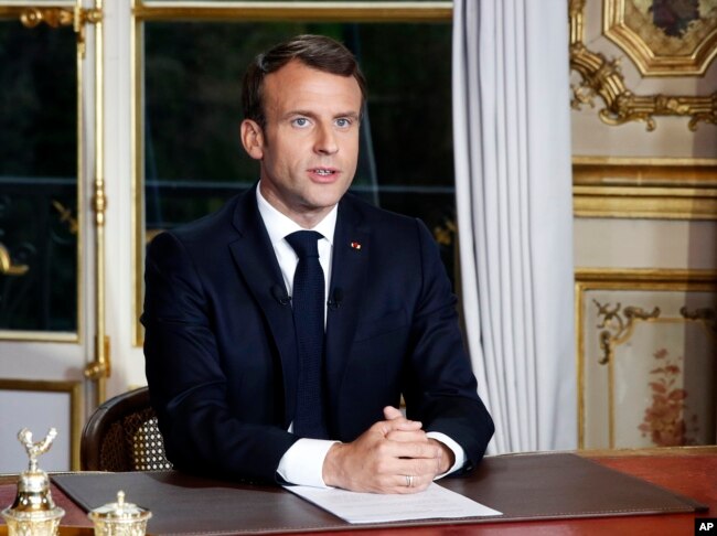 French President Emmanuel Macron addresses the nation at Elysee Palace in Paris following a massive fire at Notre Dame Cathedral, April 16 2019.