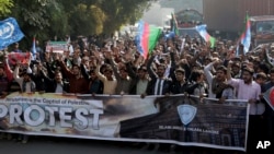 Supporters of a Pakistani religious party rally against United States in Lahore, Pakistan, Dec. 8, 2017. Hundreds of Islamists have rallied in major cities of Pakistan, condemning U.S. President Donald Trump for declaring Jerusalem as Israel's capital. 