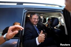 Israeli far-right lawmaker Itamar Ben-Gvir gives a thumbs up gesture after casting his vote on the day of Israel's general election in a polling station in Kiryat Arba, Nov. 1, 2022.