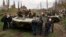 People block a column of Ukrainian Army combat vehicles on their way to the town of Kramatorsk on April 16, 2014. 