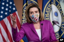 Speaker of the House Nancy Pelosi, D-Calif., holds a news conference on the day after violent protesters loyal to President Donald Trump stormed the U.S. Congress, at the Capitol in Washington, Jan. 7, 2021.