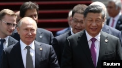 中国国家主席习近平和俄罗斯总统普京2019年6月14日在比什凯克出席上海合作组织峰会。