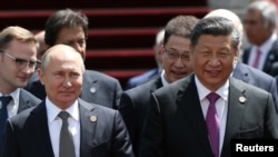 中國國家主席習近平和俄羅斯總統普京2019年6月14日在比什凱克出席上海合作組織峰會。