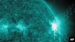This image provided by NASA shows a solar flare, the largest in 5 years. The image was was captured by NASA's Solar Dynamics Observatory (SDO) in extreme ultraviolet light at 131 Angstroms. Scientists say the bursts of radiation hurled by the solar blast