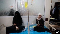 Girls are treated for a suspected cholera infection at a hospital in Sanaa, Yemen, May. 15, 2017.