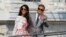U.S. actor George Clooney and his wife Amal Alamuddin leave the seven-star hotel Aman Canal Grande Venice in Venice, Italy, Sept. 28, 2014.