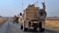  A U.S. military convoy arrives near Dahuk, Iraqi, Monday, Oct. 21, 2019. 