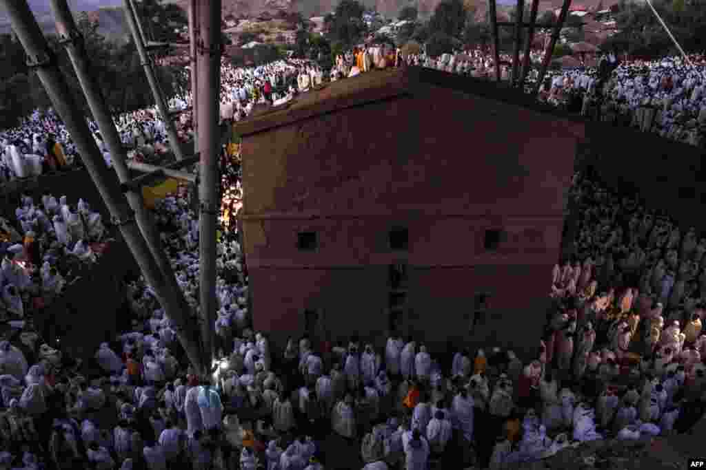 Pilgrims attend the celebration of Genna, the Ethiopian Orthodox Christmas, at Saint Mary&#39;s Church, in Lalibela, 645 kilometres (400 miles) north of Addis Ababa, in the Amhara region bordering the northern region of Tigray.