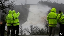 Water rushes down the Oroville Dam spillway, in Oroville, Calif., Feb. 9, 2017. State engineers on Thursday discovered new damage to the Oroville Dam spillway, the tallest in the United States, though they said there is no harm to the nearby dam and no danger to the public. Earlier this week, chunks of concrete went flying off the spillway, creating a 200-foot-long, 30-foot deep hole. 
