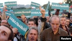 Para pendukung pemimpin oposisi Rusia, Alexei Navalny memprotes hasil pemilu walikota Moskow (9/9).