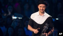 Justin Timberlake accepts video of the year award for "Mirrors" at the MTV Video Music Awards Aug. 25, 2013, at the Barclays Center in the Brooklyn borough of New York.