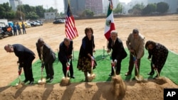 U.S. Ambassador to Mexico Roberta Jacobson, center, is accompanied by Mexico City Mayor Miguel Angel Mancera, center right, Secretary of the Interior Alfonso Navarrete Prida, center left, and other Mexican and U.S. officials during the groundbreaking ceremony for the new U.S. embassy in Mexico City, Feb. 13, 2018.
