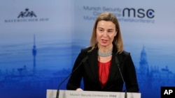 FILE - Federica Mogherini, High Representative of the European Union for Foreign Affairs and Security Policy delivers a speech at the Security Conference in Munich, Germany, Feb. 8, 2015. 