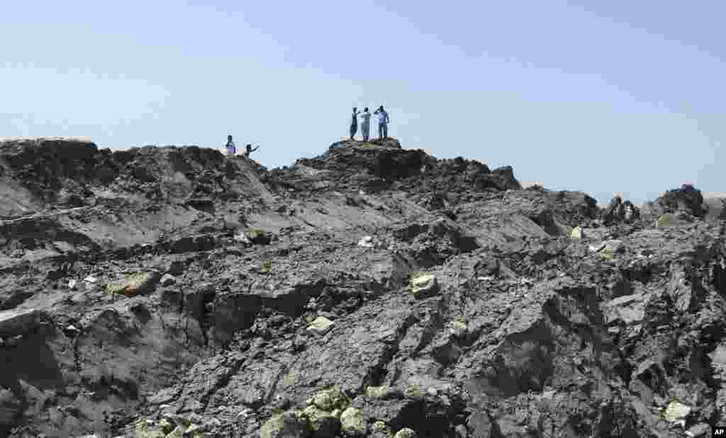 Pakistani officials say the massive earthquake that struck the remote district of Awaran in Baluchistan province was strong enough force to create a small island visible off the southern coast, Sept. 25, 2013.