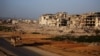 (FILE) A general view of damaged buildings in Ein Terma, a district of eastern Ghouta, Syria, Feb. 26, 2019. 