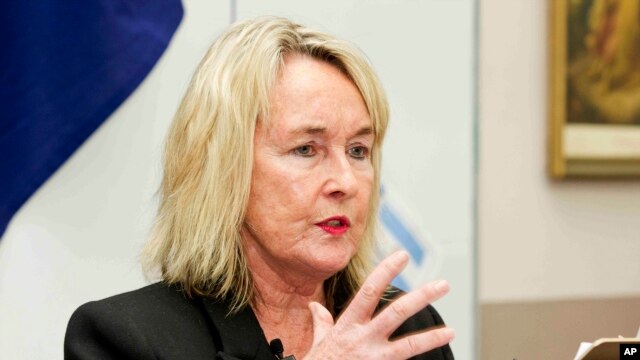 FILE - June Steenkamp, the mother of the late Reeva Steenkamp who was shot to death by her boyfriend Oscar Pistorius in 2013, delivers a lecture on women abuse to students at Saint Dominic's school in Port Elizabeth, South Africa, Oct. 21, 2015.