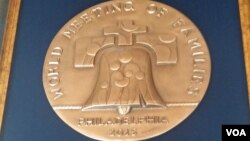 A medal commemorating the World Meeting of Families. (VOA / M. Besheer)