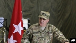 Incoming Lieutenant General Curtis M. Scaparrotti speaks during a change of command ceremony in Kabul. (File Photo - July 11, 2011)
