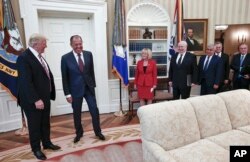 U.S. President Donald Trump meets with Russian Foreign Minister Sergey Lavrov, second left, at the White House in Washington, May 10, 2017. (Russian Foreign Ministry photo via AP)