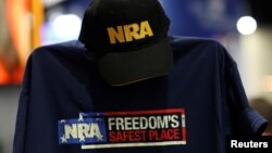 A cap and shirt are displayed at the booth for the National Rifle Association (NRA) at the Conservative Political Action Conference (CPAC) at National Harbor, Maryland, U.S., Feb. 23, 2018. 