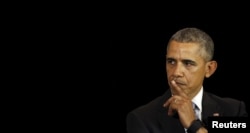 U.S. President Barack Obama pauses while speaking about his Supreme Court nominee to students at the University of Chicago Law School, where Obama taught constitutional law for over a decade, in Chicago, April 7, 2016.