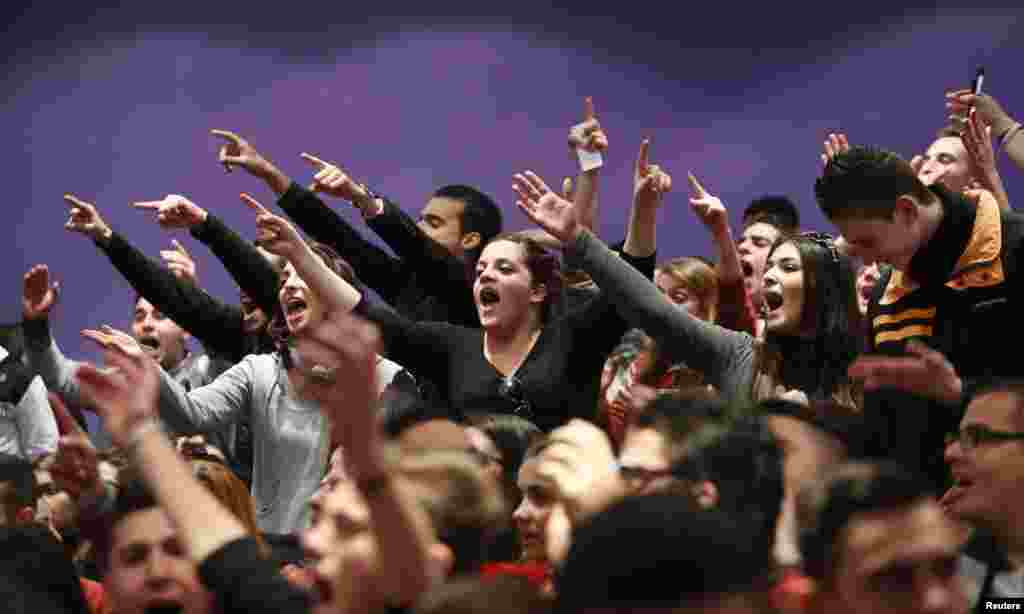 Students supporting the Labor Party taunt the Nationalist Party opponents before a political leaders debate at the Malta College of Arts, Science and Technology in Paola, outside Valletta, Malta, February 20, 2013. 