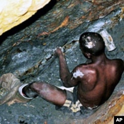 A Congolese miner chips away inside a deep mine west of the eastern Congolese town of Goma, Kivu region (File)