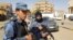 FILE - Forces loyal to Libyan strongman Khalifa Haftar patrol in the southern Libyan city of Sabha, Feb. 9, 2019. An attack by militants May 4, 2019, on guards near a Sabha air base left nine soldiers dead. 