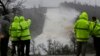 Water Flows Over Emergency Spillway at Tallest US Dam