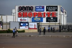 Security men are seen at the gate of Jabi Lake mall in Utako, Abuja, Nigeria, Sept. 4, 2019.