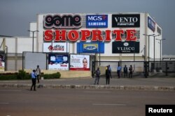 Security men are seen at the gate of Jabi Lake mall in Utako, Abuja, Nigeria, Sept. 4, 2019.