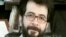 Kamran Ayazi appears in this undated portrait from his Facebook and YouTube pages. The rights activist is one of two who reportedly have been detained in Iran.