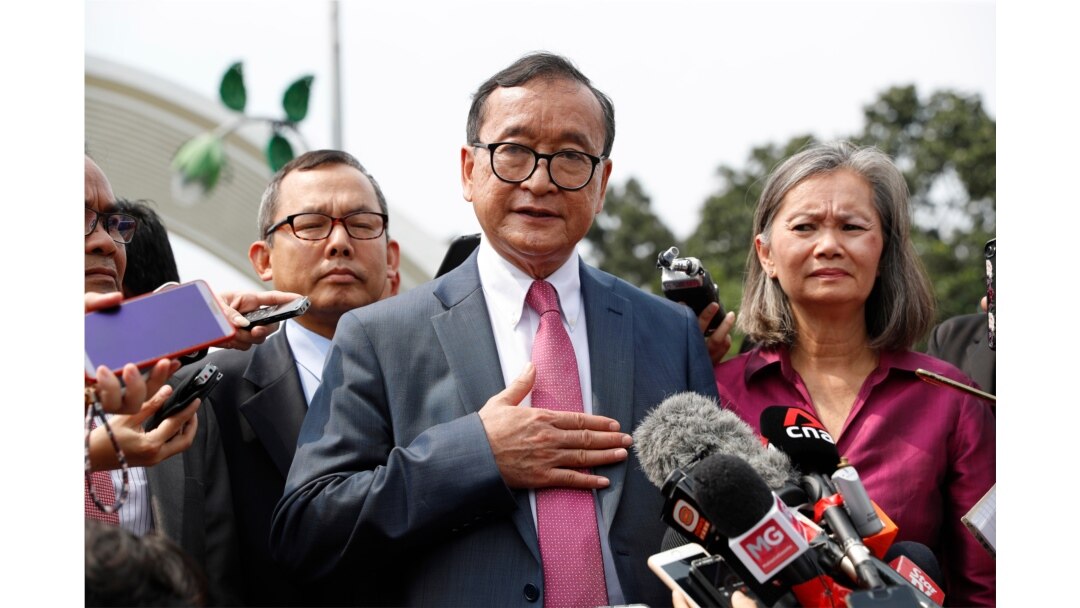 FILE - Cambodia's exiled opposition leader Sam Rainsy talks to the media outside Parliament House in Kuala Lumpur, Malaysia, Nov. 12, 2019.