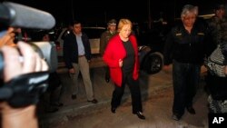 Chile's President Michelle Bachelet arrives to the National Emergency Office (ONEMI) after a strong aftershock in Arica, Chile, April 3, 2014. 