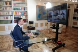 Spanish Prime Minister Pedro Sanchez holds a videoconference with some of his ministers over the coronavirus outbreak, at the Moncloa Palace in Madrid, March 13, 2020.